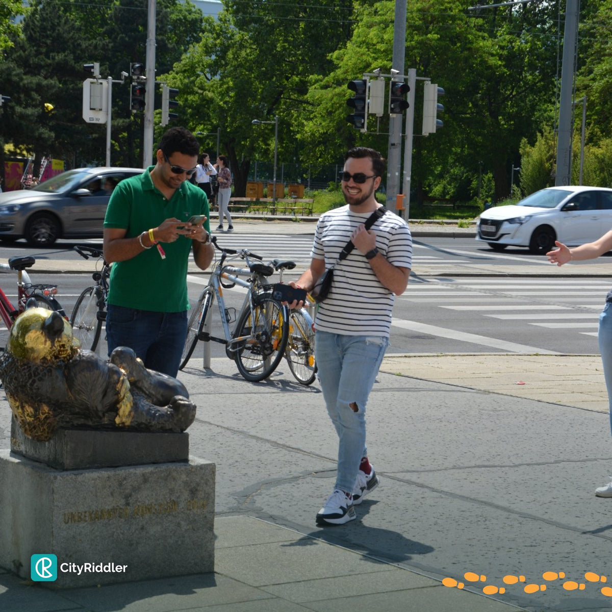 A group walks to the next station with the app